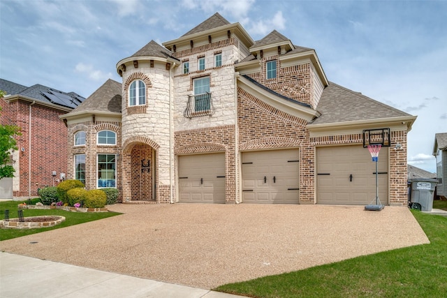 513 Yarrow St, Little Elm, TX 75068 - french country inspired facade with a shingled roof, brick siding, and driveway