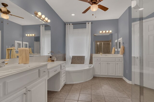 1661 Terrace Dr, Lantana, TX 76226 - bathroom featuring a ceiling fan, a stall shower, a garden tub, two vanities, and tile patterned floors