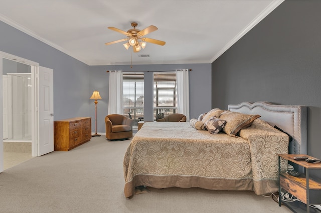 carpeted bedroom with a ceiling fan, baseboards, ornamental molding, and connected bathroom