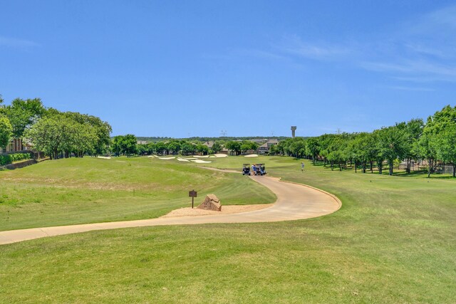 1661 Terrace Dr, Lantana, TX 76226 - view of community with golf course view and a yard