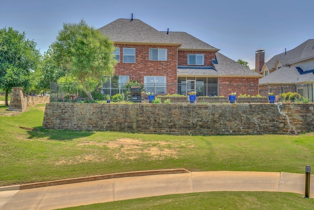 1661 Terrace Dr, Lantana, TX 76226 - rear view of house with roof with shingles and brick siding