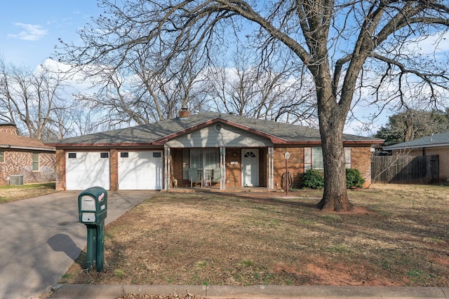 ranch-style home with a garage, driveway, a chimney, fence, and brick siding