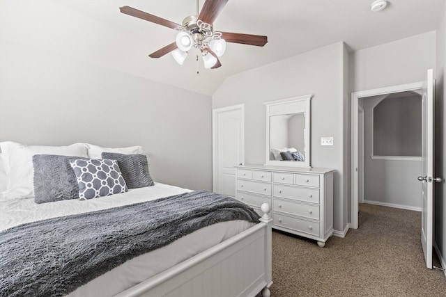 carpeted bedroom featuring lofted ceiling, ceiling fan, and baseboards