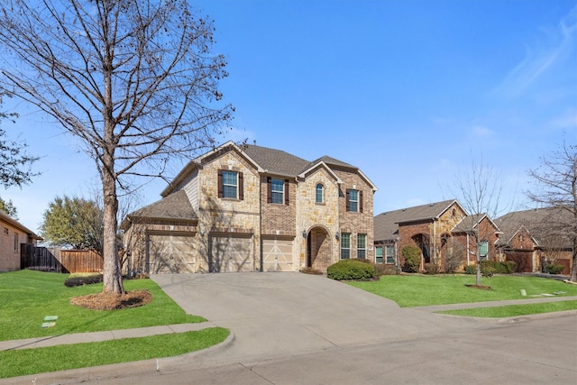 view of front facade with stone siding, fence, driveway, and a front lawn