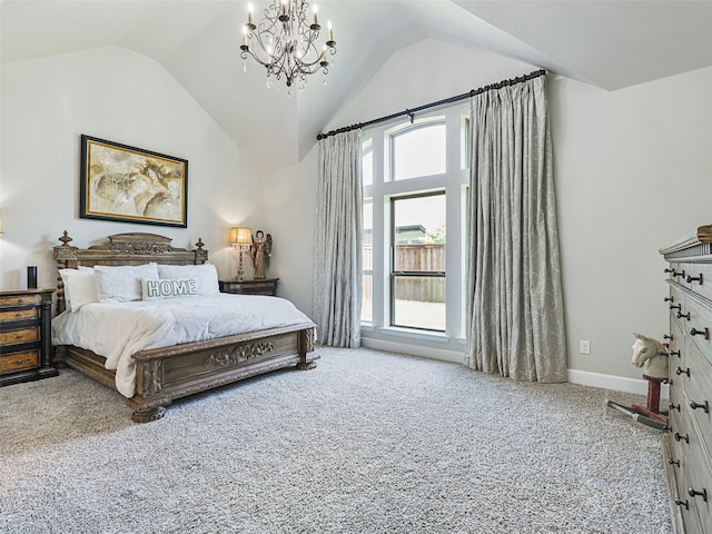 carpeted bedroom with baseboards, high vaulted ceiling, and an inviting chandelier