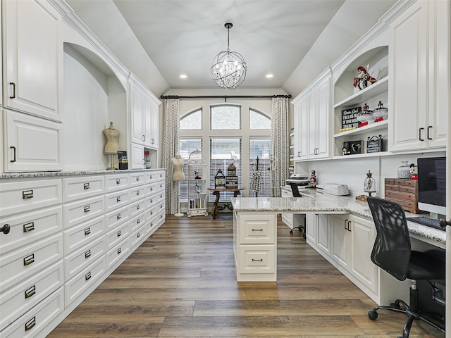 office featuring dark wood-style floors, vaulted ceiling, a notable chandelier, and recessed lighting