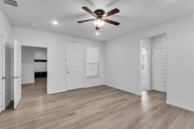 unfurnished room with recessed lighting, a ceiling fan, baseboards, visible vents, and light wood-style floors