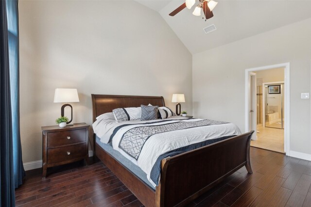 bedroom with a ceiling fan, vaulted ceiling, baseboards, and wood finished floors