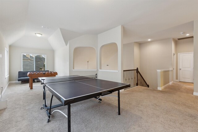 entryway with a towering ceiling, baseboards, dark wood finished floors, and arched walkways