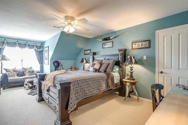 carpeted bedroom with baseboards, visible vents, and a ceiling fan