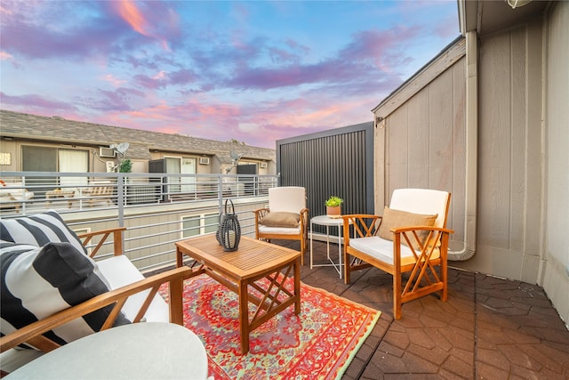 view of patio / terrace with a balcony