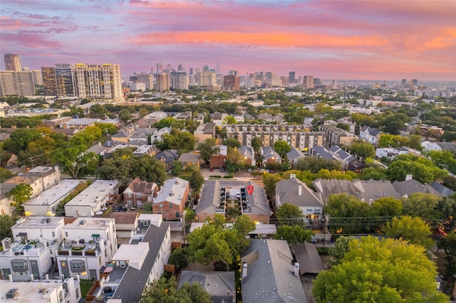 aerial view at dusk with a view of city