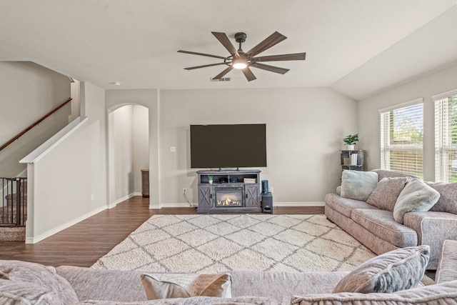 4137 Agatha Ln, Celina, TX 76227 - living room with stairs, wood finished floors, a ceiling fan, arched walkways, and vaulted ceiling