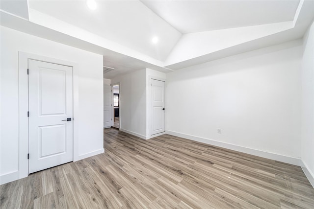6305 Pine St, Rowlett, TX 75089 - unfurnished room with light wood-type flooring, baseboards, lofted ceiling, and recessed lighting