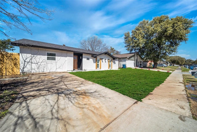 6305 Pine St, Rowlett, TX 75089 - view of front of property with driveway and a front lawn