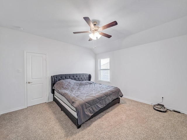 bedroom featuring ceiling fan, carpet, and baseboards