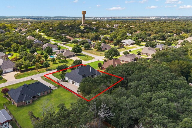 aerial perspective of suburban area with property parcel outlined