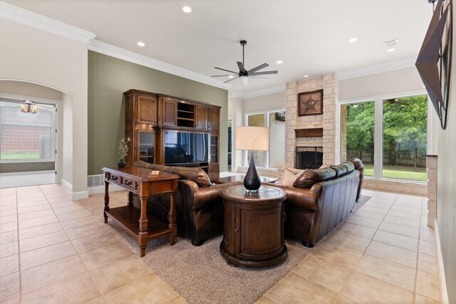 living area with ceiling fan, a fireplace, light tile patterned floors, crown molding, and recessed lighting