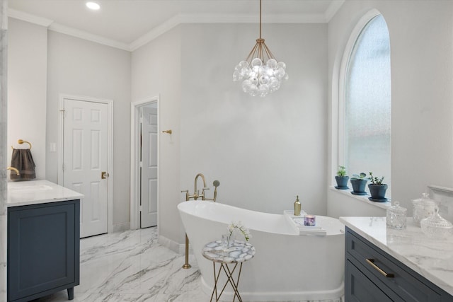 bathroom featuring marble finish floor, a healthy amount of sunlight, crown molding, and vanity