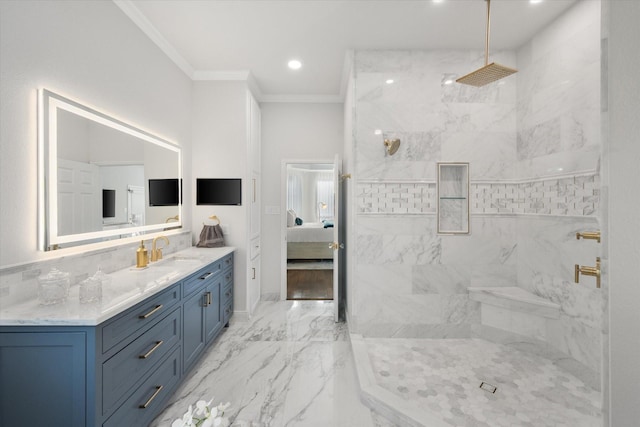 bathroom featuring marble finish floor, crown molding, a marble finish shower, ensuite bathroom, and vanity