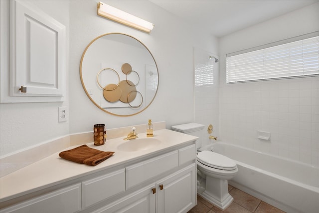 full bath with shower / bathing tub combination, vanity, toilet, and tile patterned floors