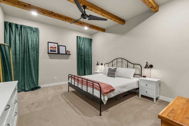 bedroom with recessed lighting, beam ceiling, light carpet, and baseboards