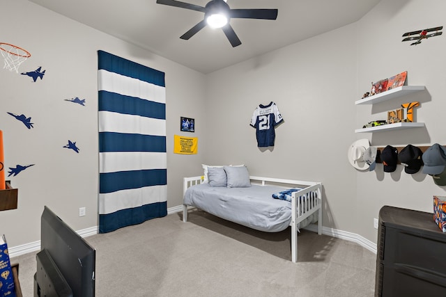 bedroom with carpet floors, baseboards, and a ceiling fan