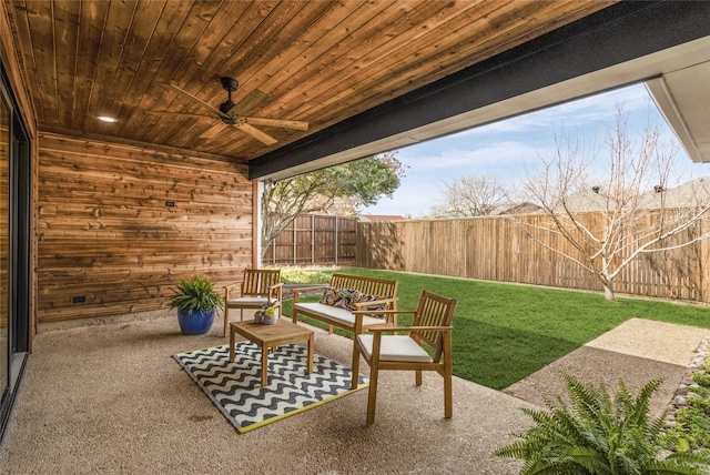 view of patio / terrace with a fenced backyard, ceiling fan, and an outdoor hangout area