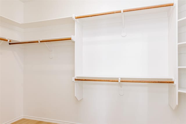 walk in closet featuring light wood-type flooring