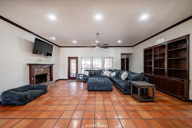 living room featuring light tile patterned floors, ornamental molding, a fireplace, and recessed lighting