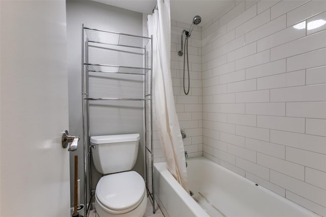 bathroom with toilet and shower / tub combo