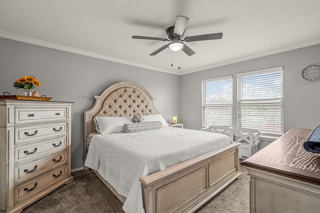 bedroom with ceiling fan, dark carpet, and crown molding