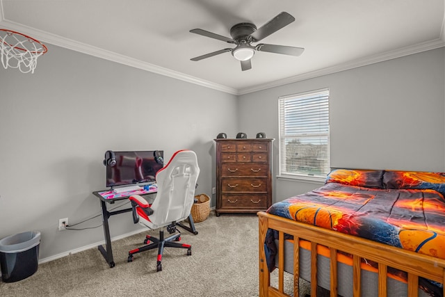 carpeted bedroom featuring a ceiling fan, crown molding, and baseboards