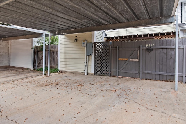 view of gate with fence