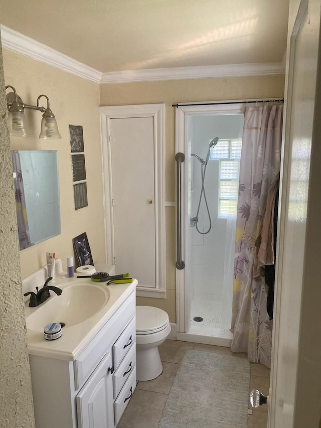 full bath with a stall shower, toilet, ornamental molding, tile patterned floors, and vanity