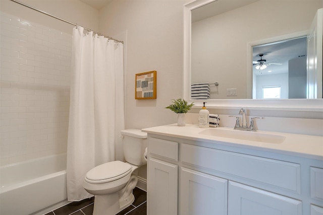 bathroom featuring tile patterned flooring, shower / tub combo with curtain, vanity, and toilet