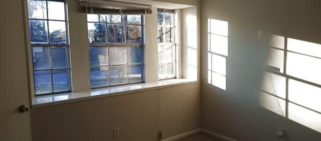 spare room featuring a healthy amount of sunlight