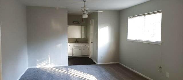 interior space with baseboards