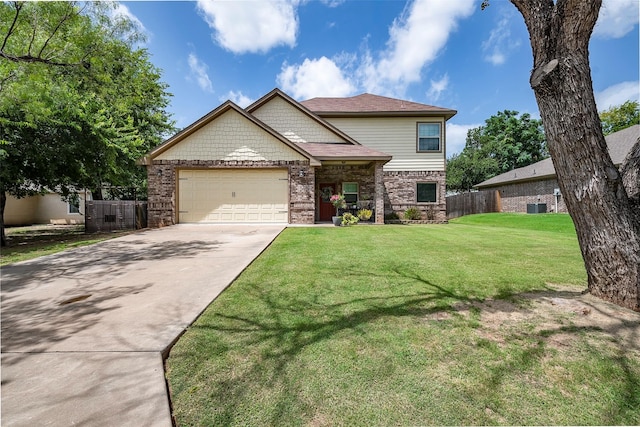 view of front of house with a garage, brick siding, fence, driveway, and a front lawn