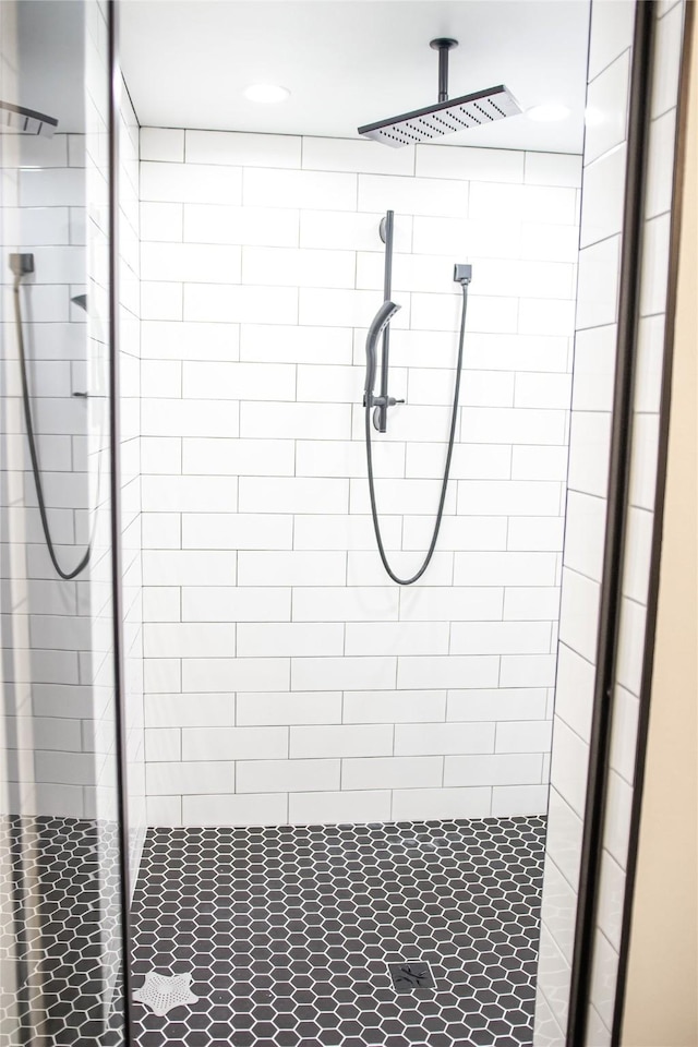 bathroom featuring a shower stall