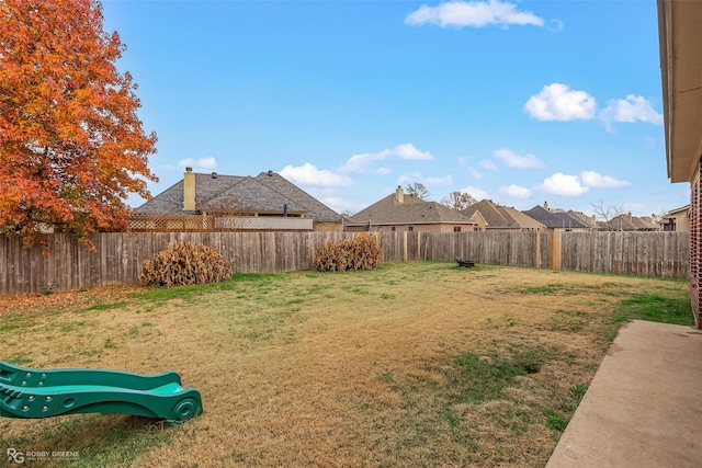 view of yard featuring a fenced backyard