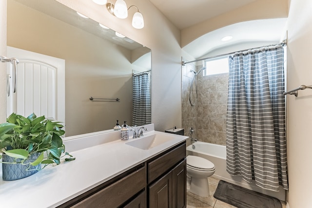 full bathroom featuring toilet, shower / bath combo, tile patterned flooring, and vanity