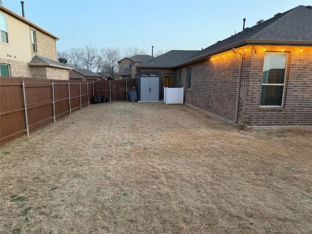 view of yard featuring a fenced backyard