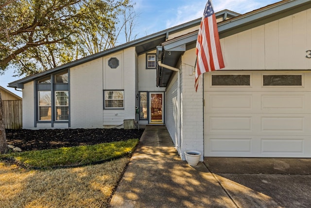 view of front of home with brick siding