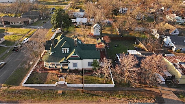 birds eye view of property with a residential view
