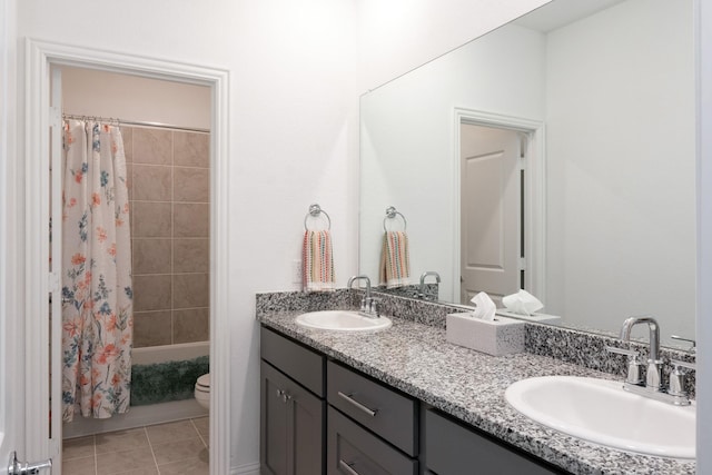 1624 Thunderbird Dr, Fort Worth, TX 76052 - bathroom with toilet, tile patterned flooring, a sink, and double vanity