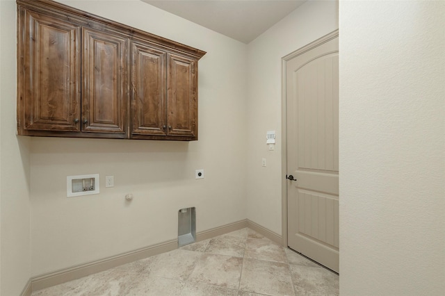 laundry room with cabinet space, baseboards, gas dryer hookup, hookup for a washing machine, and electric dryer hookup