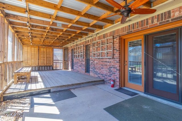 interior space featuring ceiling fan