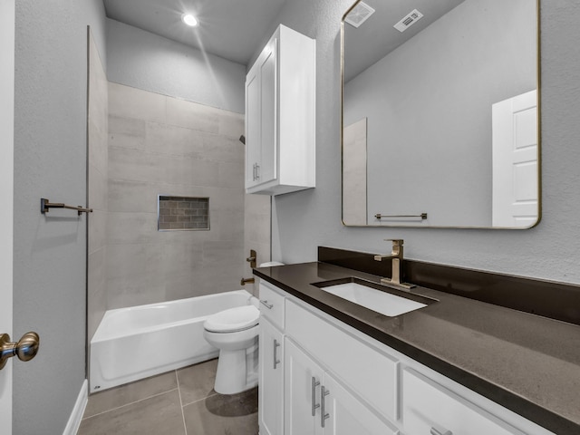 full bathroom with visible vents, vanity, toilet, and tile patterned floors