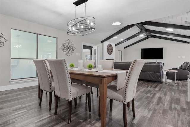 dining area with vaulted ceiling with beams, wood finished floors, plenty of natural light, baseboards, and ceiling fan with notable chandelier